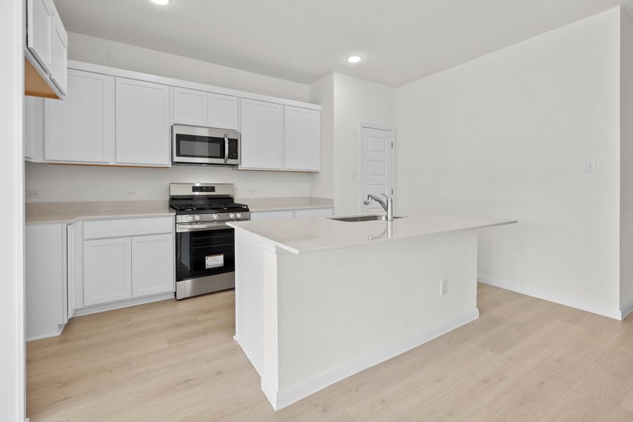 Furnished interior view inside a new home in Trinity Ranch, Elgin (Image 9).