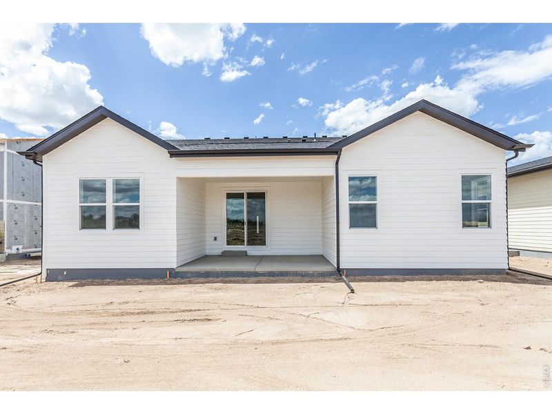 Exterior details and patio area of a home in Prairie Song Story Collection - Single Family Homes, Windsor (Image 4).