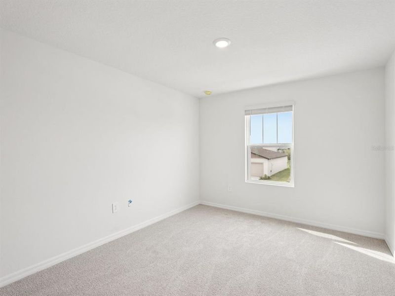 Spacious, unfurnished interior of a new home in Magnolia Bay - Classic Series, Nokomis (Image 15).