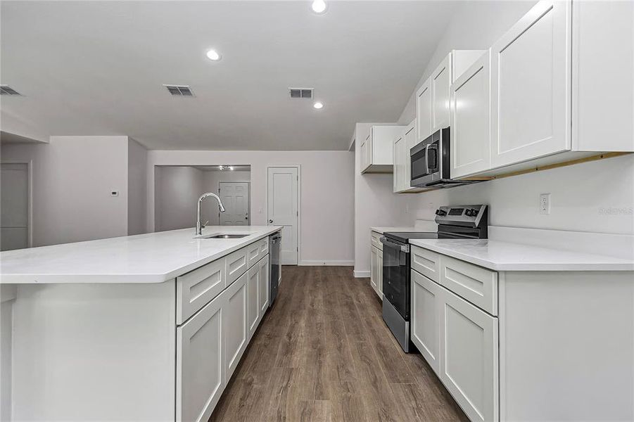 Furnished interior view inside a new home in , Dunnellon (Image 7).