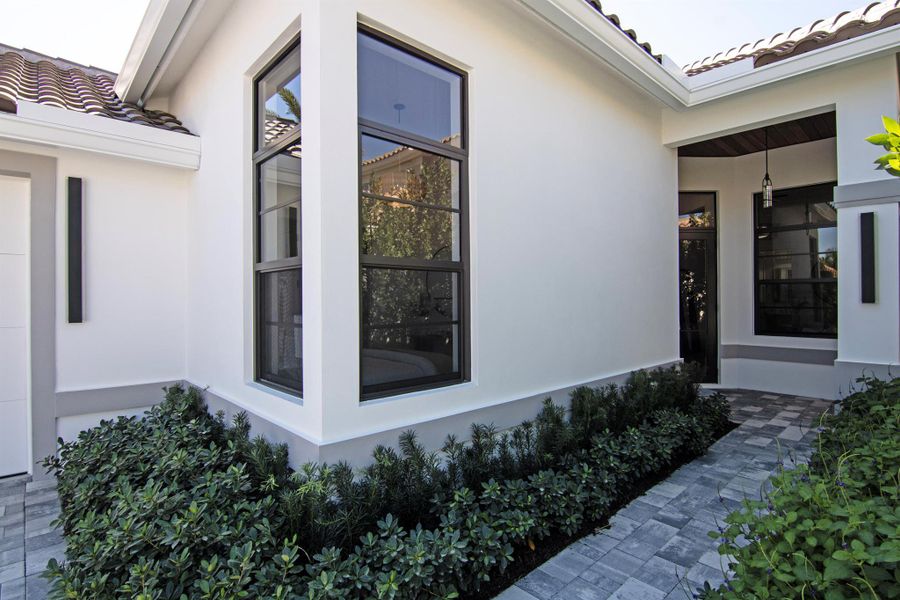 Exterior details and patio area of a home in , Wellington (Image 35).