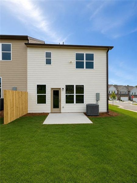Exterior details and patio area of a home in Somerset at Riverbrook, Gainesville (Image 23).