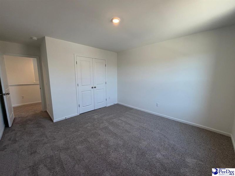 Spacious, unfurnished interior of a new home in The Grove, Florence (Image 32).