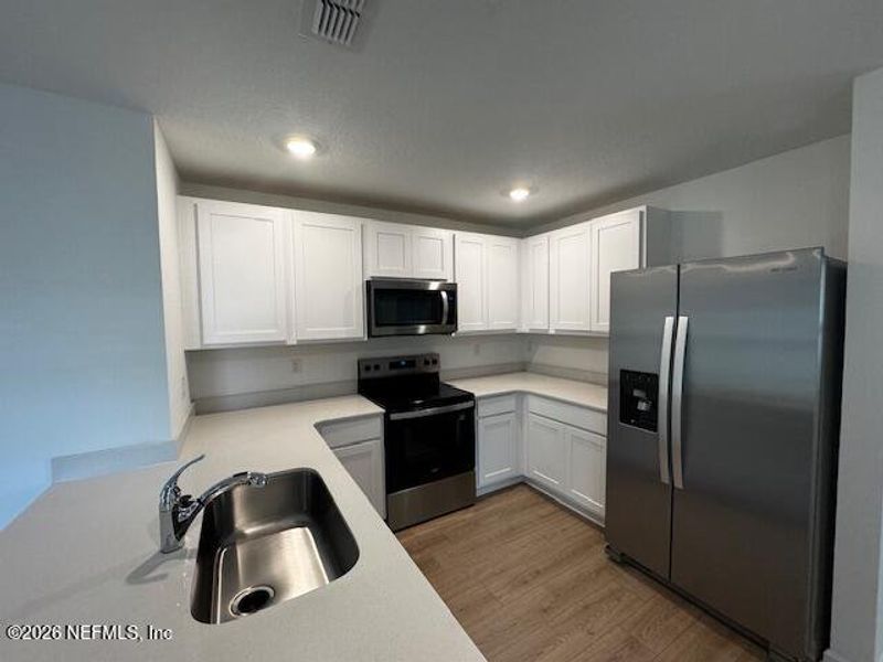 Furnished interior view inside a new home in Copes Landing, Jacksonville (Image 13).