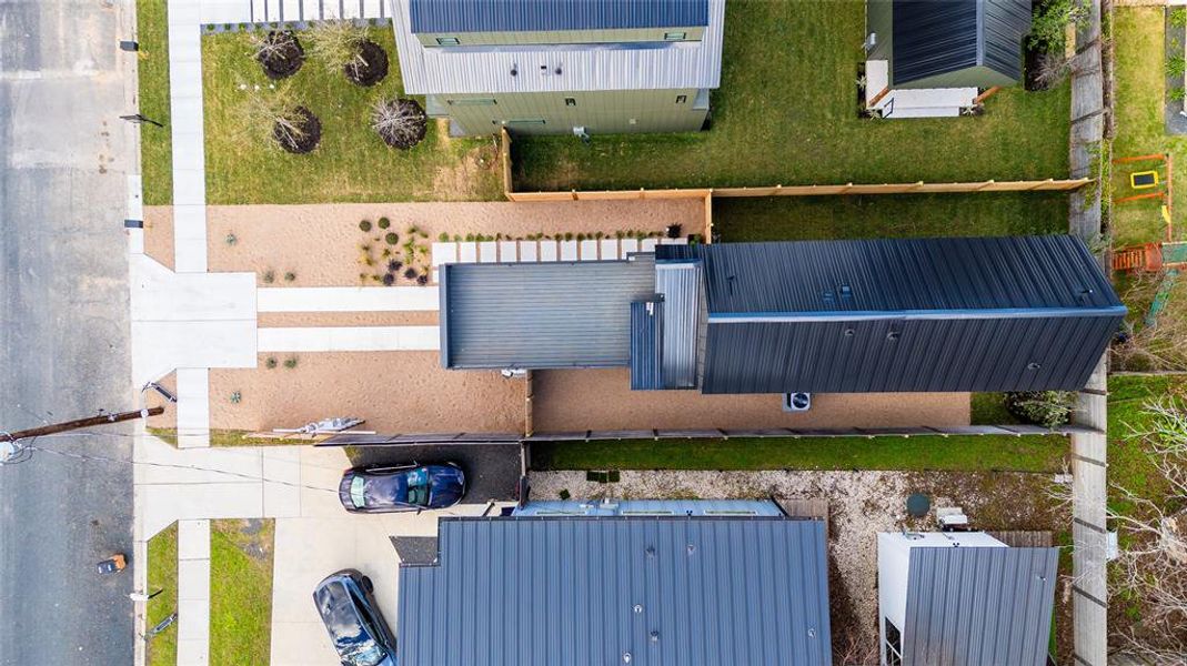 Aerial view of Unit 2. Can you see that big beautiful second story deck? With the warm Texas spring and fall I can see lots of time being spent out here!