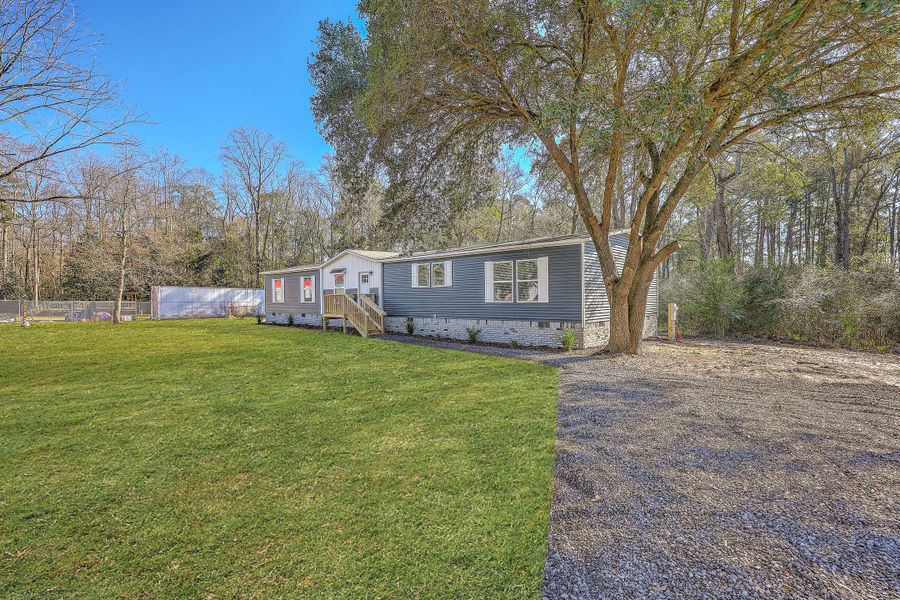 Exterior details and patio area of a home in , Summerville (Image 13).