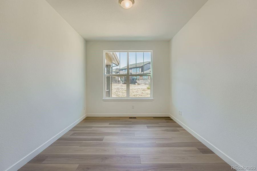 Spacious, unfurnished interior of a new home in Ken-Caryl Ranch: The Monarch Collection, Littleton (Image 11).