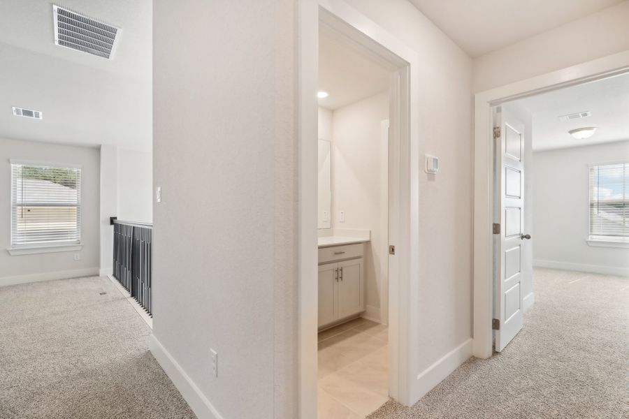 Hallway in the Medina floorplan at a Meritage Homes community.