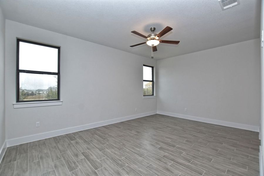 Representative unfurnished interior of a home built from the Avalon by Giddens Homes in Scofield Farms Estates, Georgetown (Image 134).