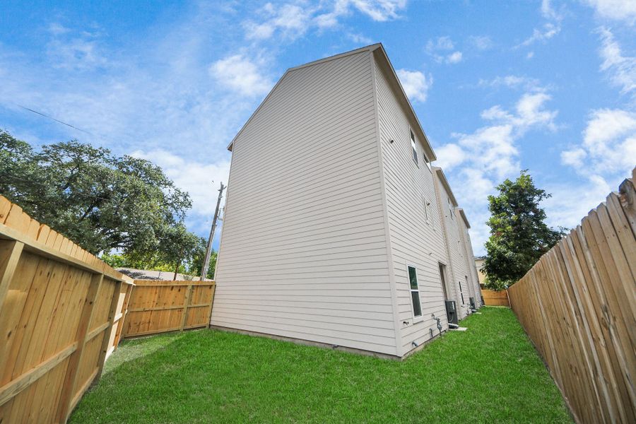 Exterior details and patio area of a home in , Houston (Image 4). Exterior details and patio area of a home in , Houston (Image 4).