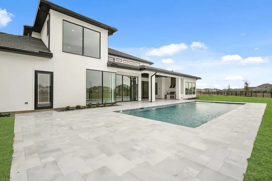 Exterior details and patio area of a home in Bridgeland, Cypress (Image 3).