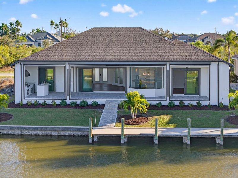 Exterior details and patio area of a home in , Port Charlotte (Image 27).
