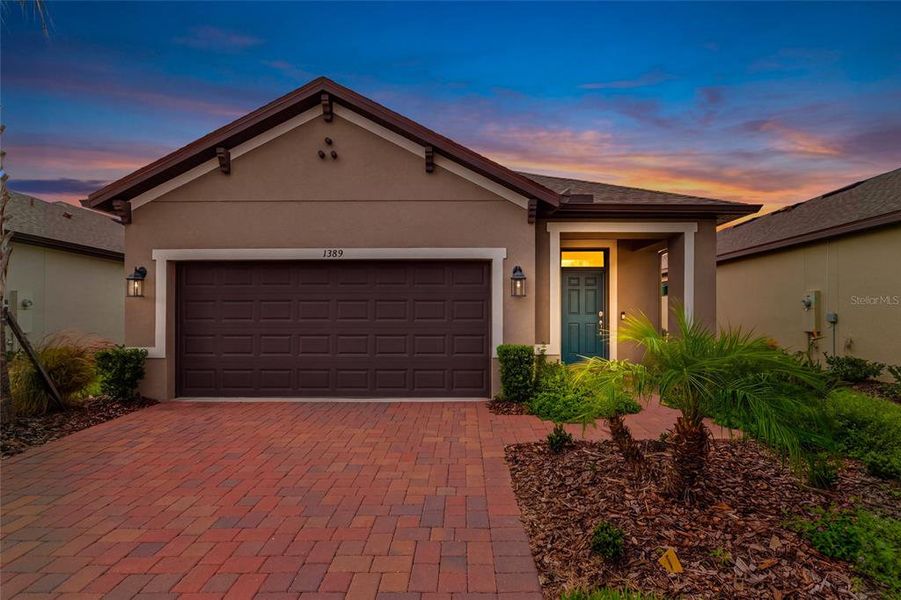 Front exterior of a new home in , Poinciana, FL, highlighting curb appeal (Image 23).