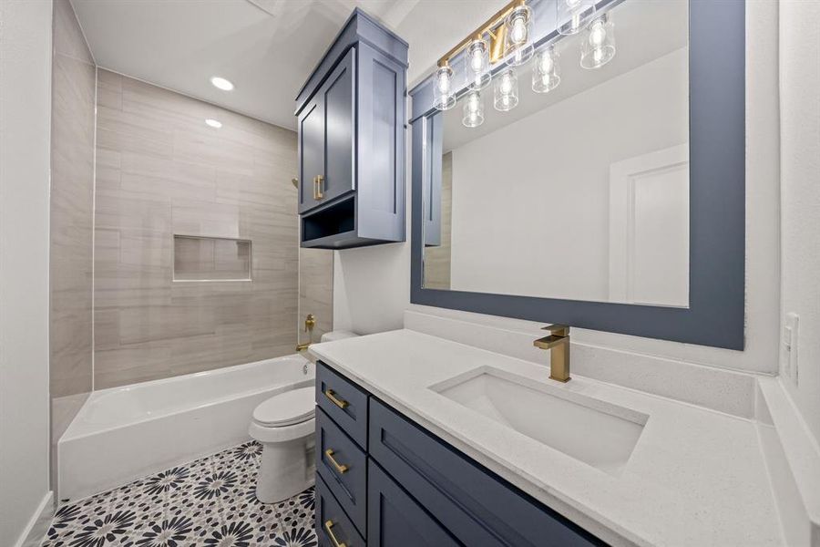 Full bath with vanity, shower / tub combination, recessed lighting, and tile patterned flooring Full bath with vanity, shower / tub combination, recessed lighting, and tile patterned flooring