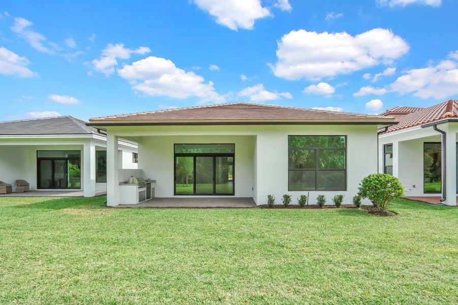 Exterior details and patio area of a home in Cove Royale, Stuart (Image 18).