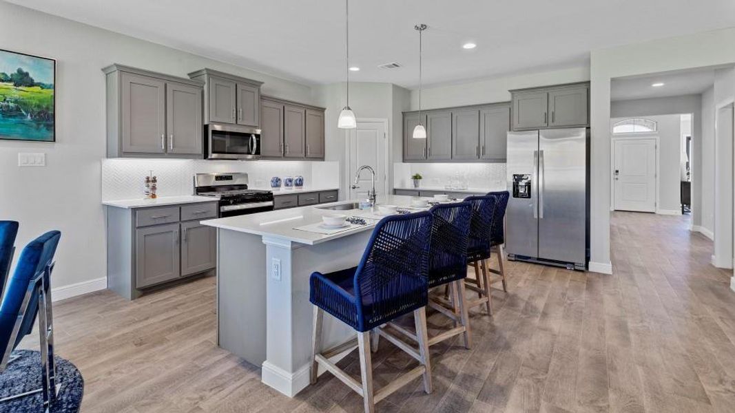 Kitchen - All Home and community information, including pricing, included features, terms, availability and amenities, are subject to change at any time without notice or obligation. All Drawings, pictures, photographs, video, square footages, floor plans, elevations, features, colors and sizes are approximate for illustration purposes only and will vary from the homes as built.