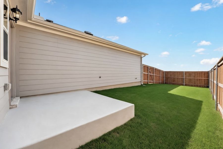 Exterior details and patio area of a home in Emory Crossing, Hutto (Image 3).