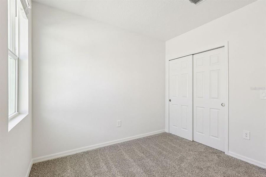 Spacious, unfurnished interior of a new home in Springs at Lake Alfred - Classic Series, Lake Alfred (Image 22).