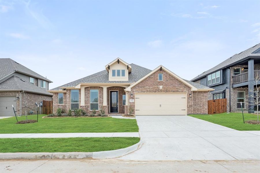 Front exterior of a new home in Hampton Park, Glenn Heights, TX, highlighting curb appeal (Image 1). Front exterior of a new home in Hampton Park, Glenn Heights, TX, highlighting curb appeal (Image 1).