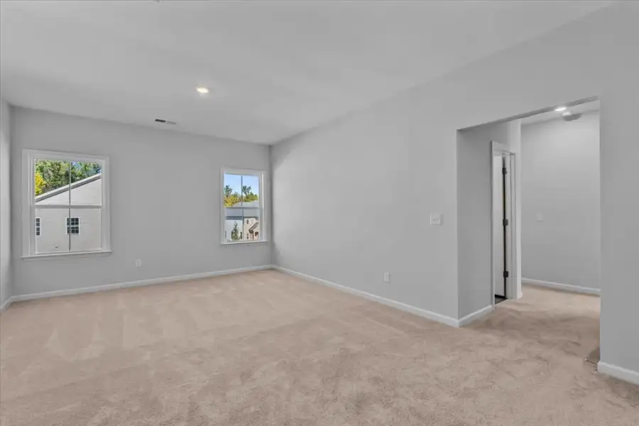 Spacious, unfurnished interior of a new home in Lilah Grove, Summerfield (Image 45).