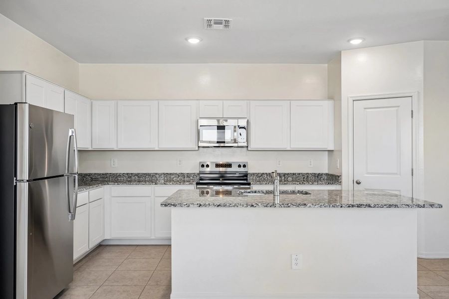 Representative furnished interior of a home built from the Prism by Starlight Homes in Stonebridge Manor, Waddell (Image 9).