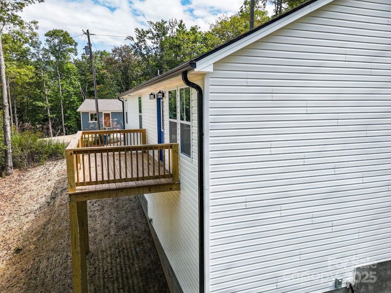 Front exterior of a new home in , Etowah, NC, highlighting curb appeal (Image 2). Front exterior of a new home in , Etowah, NC, highlighting curb appeal (Image 2).
