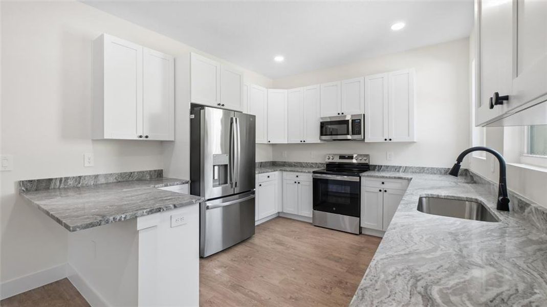 Furnished interior view inside a new home in , Tampa (Image 16). Furnished interior view inside a new home in , Tampa (Image 16).