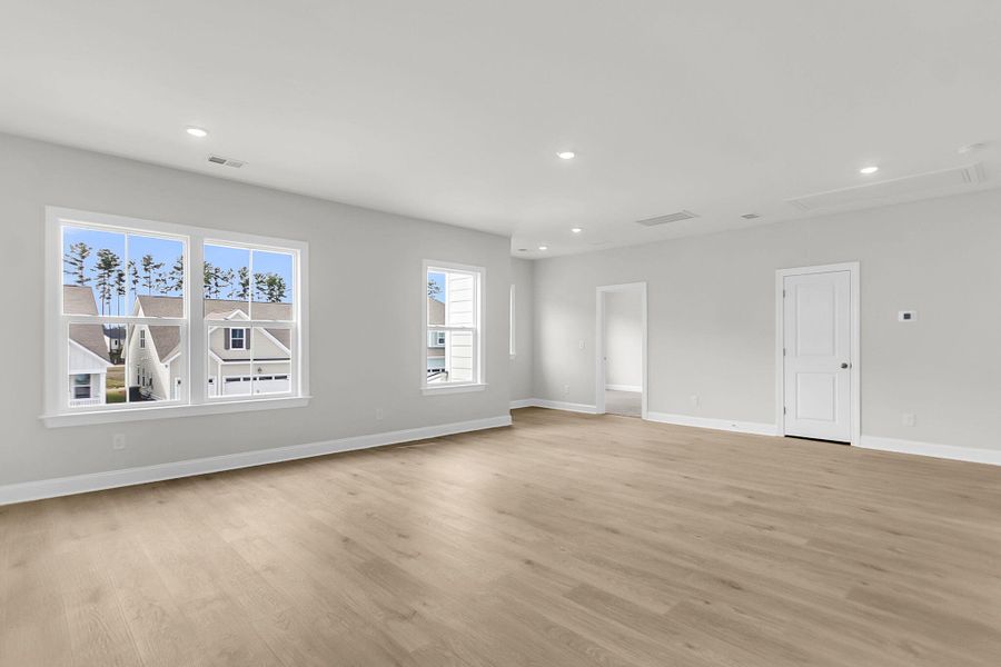 Spacious, unfurnished interior of a new home in Tidewater at Lakes of Cane Bay, Summerville (Image 45).