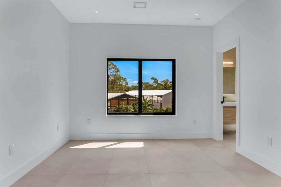 Spacious, unfurnished interior of a new home in , Jupiter (Image 12).