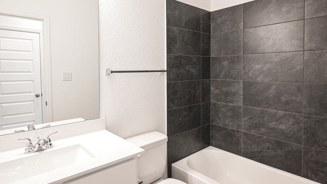 Furnished interior view inside a new home in Crosswinds 40', Kyle (Image 12).