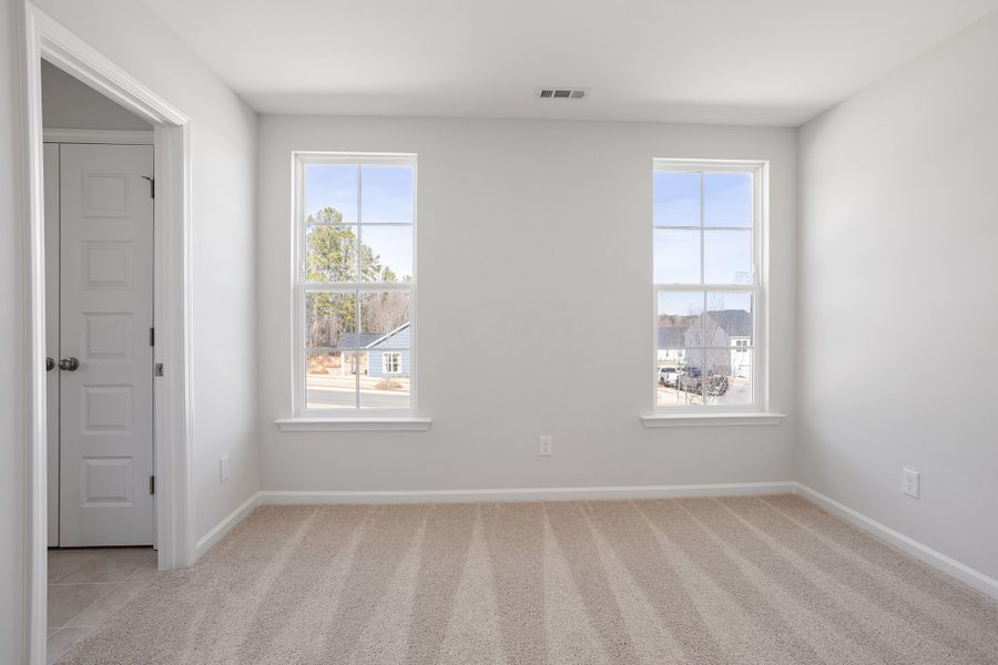 Spacious, unfurnished interior of a new home in Renaissance at White Oak, Garner (Image 27).