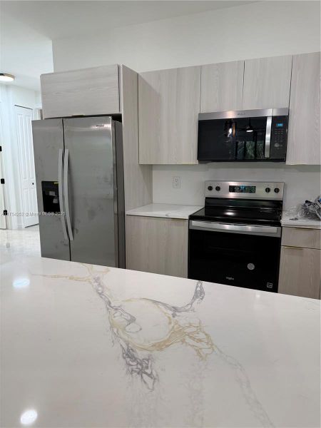 Furnished interior view inside a new home in , Punta Gorda (Image 33).