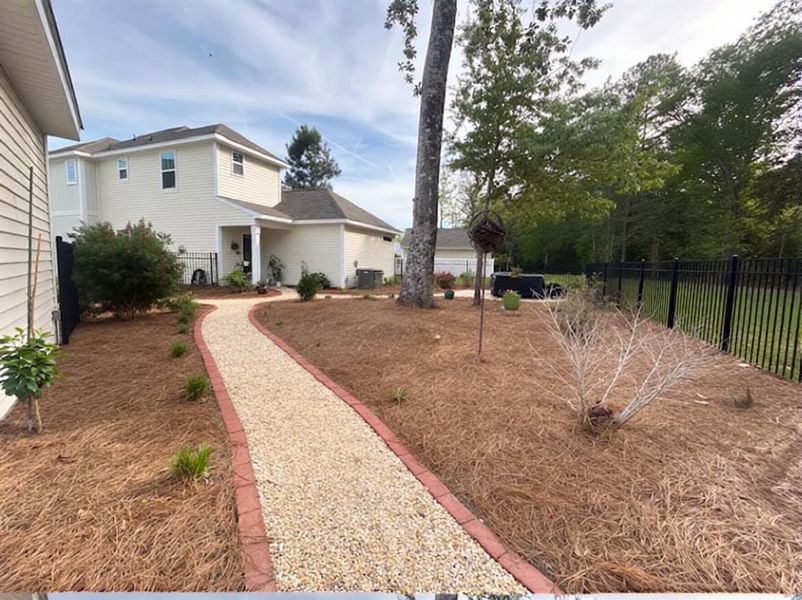 Exterior details and patio area of a home in , Okatie (Image 20).
