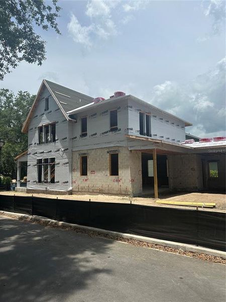 Front exterior of a new home in , Winter Garden, FL, highlighting curb appeal (Image 8).