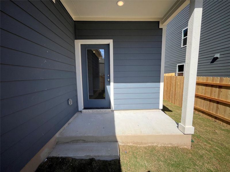 Exterior details and patio area of a home in Lariat, Liberty Hill (Image 4).