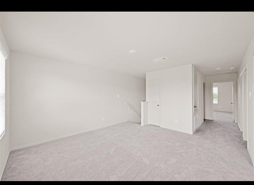 Spacious, unfurnished interior of a new home in Spring Creek Trails, Magnolia (Image 14).