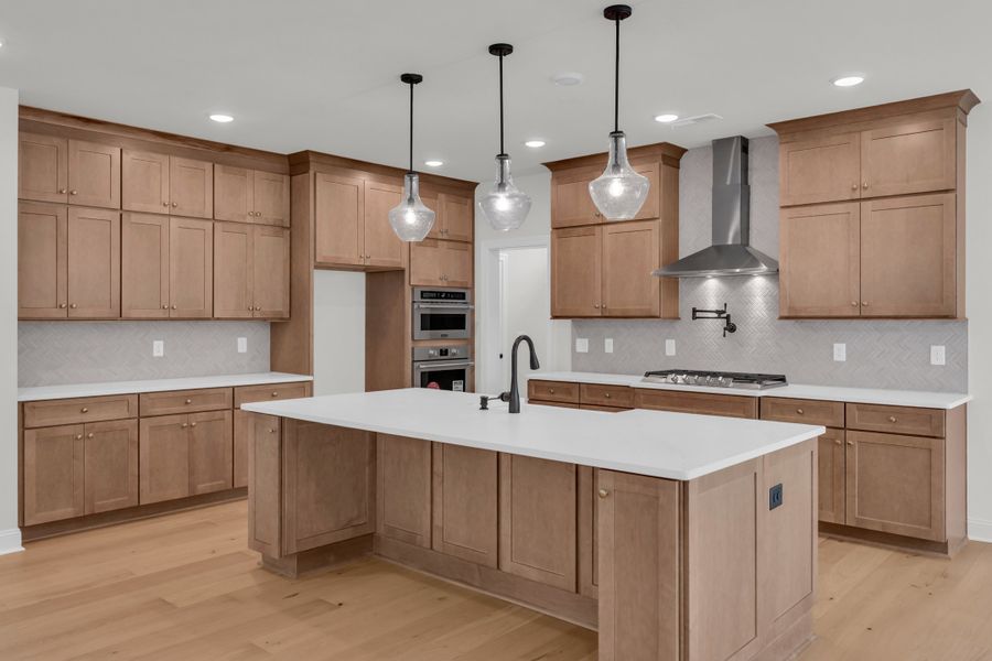 Representative furnished interior of a home built from the The Hampton by RobuckHomes in Stonehenge, Raleigh (Image 20).