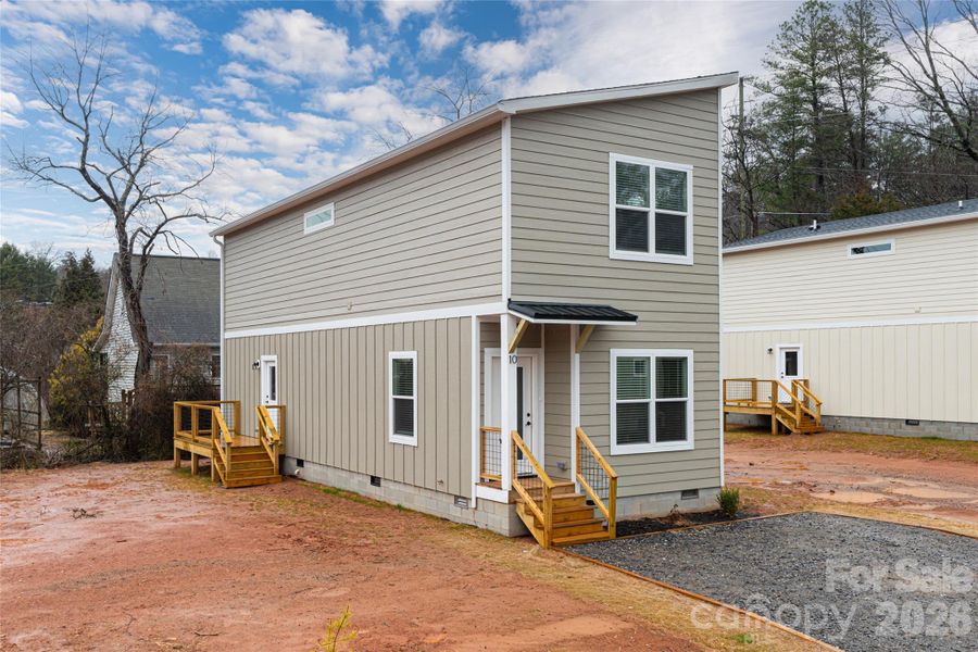Exterior details and patio area of a home in , Asheville (Image 28).