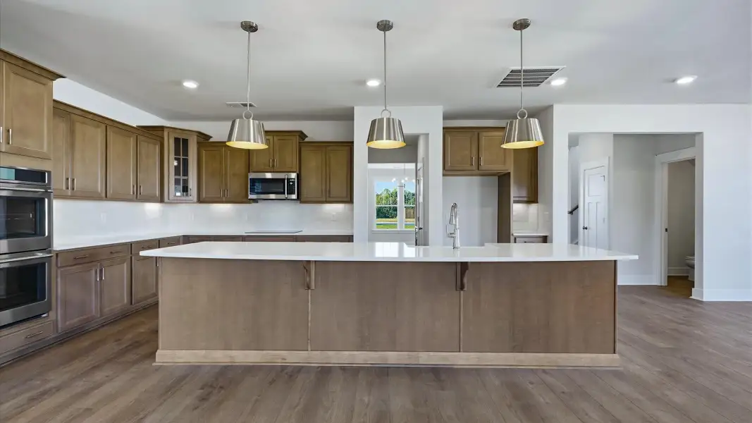 Well-designed kitchen with a center island and tasteful finishes that elevate everyday living near Spartanburg, SC Well-designed kitchen with a center island and tasteful finishes that elevate everyday living near Spartanburg, SC