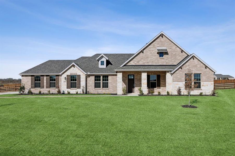 View of front of home featuring a front yard