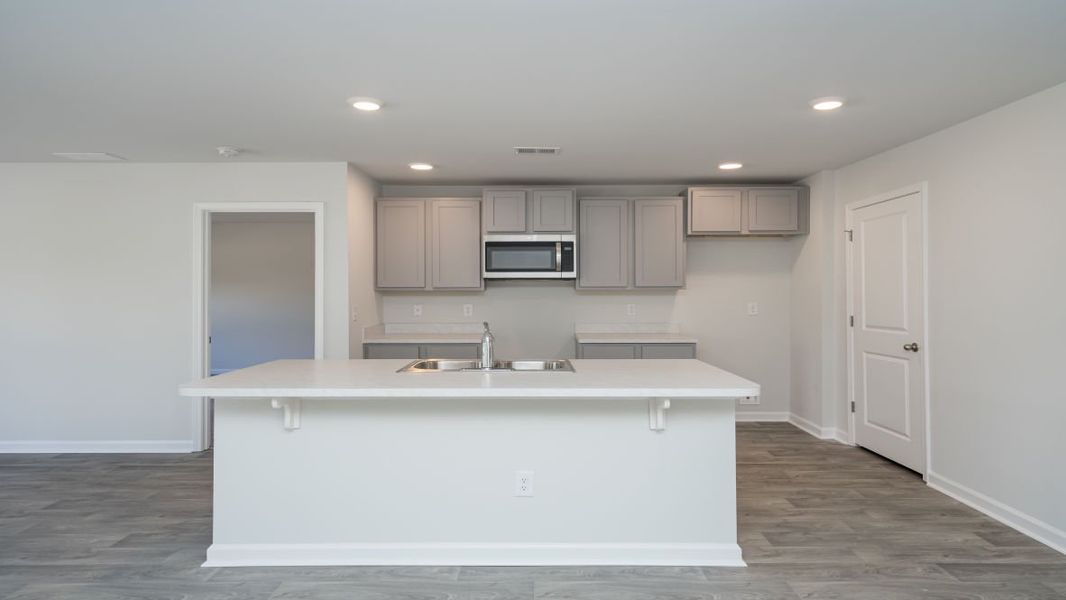 Representative furnished interior of a home built from the ARIA by D.R. Horton in Stanbury Creek, Supply (Image 4).