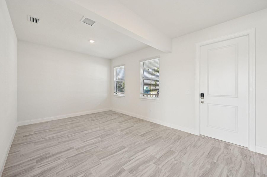 Spacious, unfurnished interior of a new home in Brystol at Wylder - Reserve Series, Port St. Lucie (Image 16).