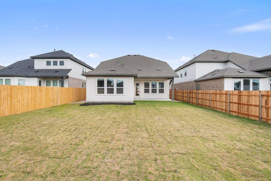 Exterior details and patio area of a home in Arbor Collection at Heritage, Dripping Springs (Image 27).