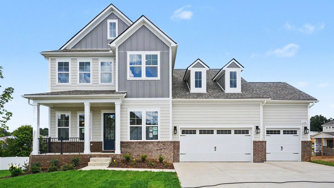 Front exterior with 3-car garage Front exterior with 3-car garage