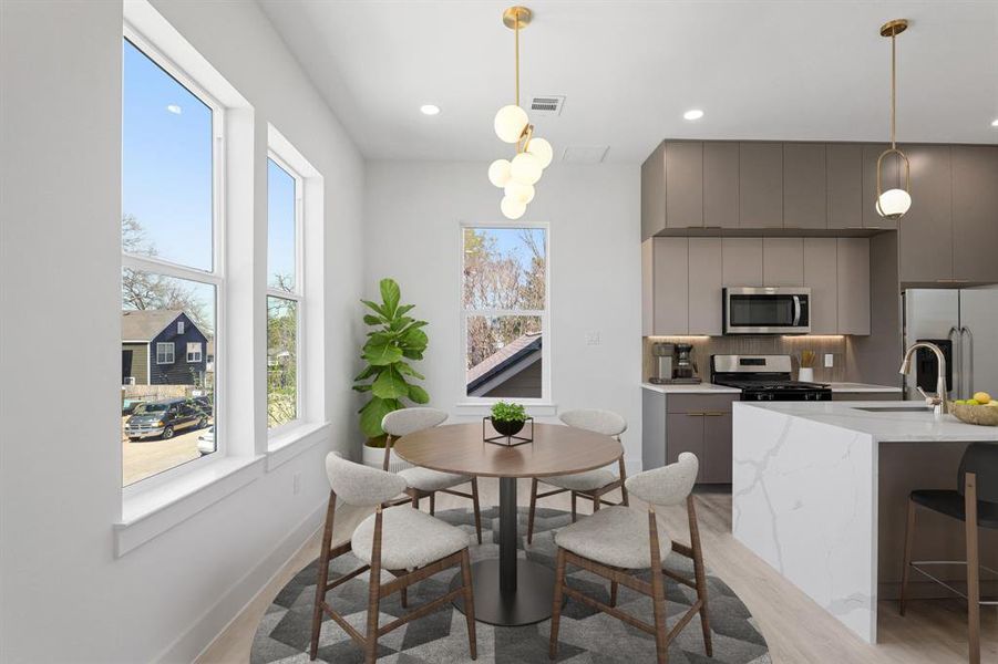 Virtually Staged: The dining area conveniently off the kitchen is perfect for your family meals!