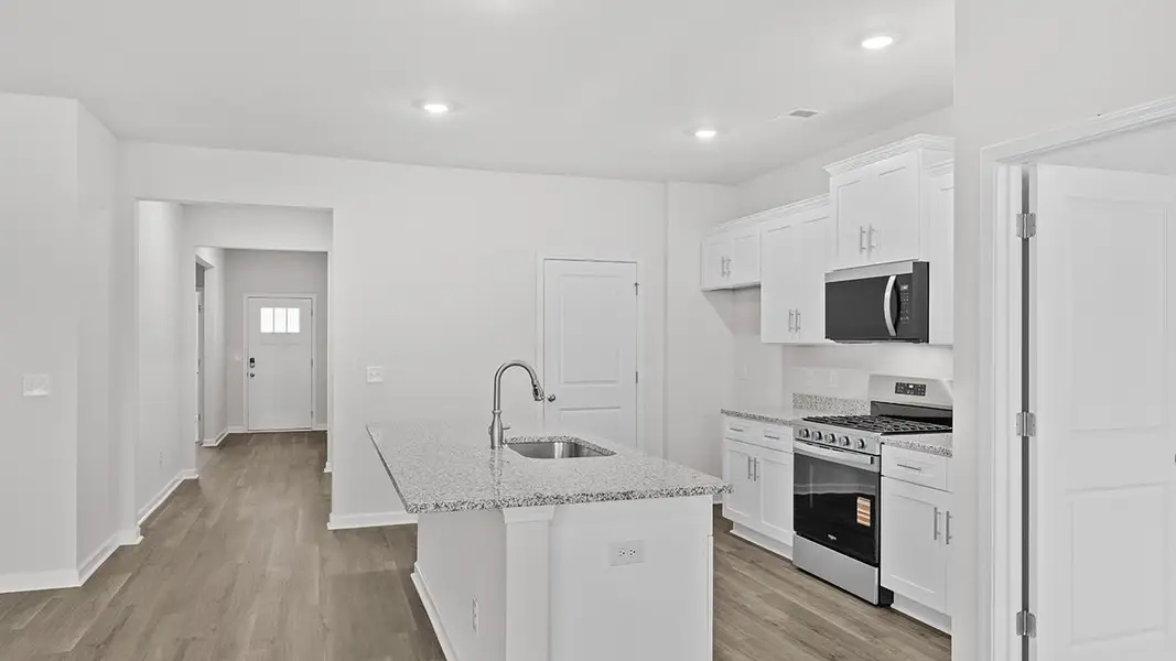 Furnished interior view inside a new home in Highland Hills, Graniteville (Image 8).