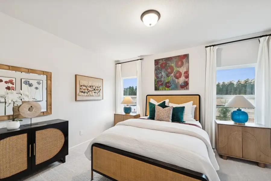The Princeton II- Bedroom 2. Staged model home shown for illustration only; actual features, colors, and upgrades may vary.