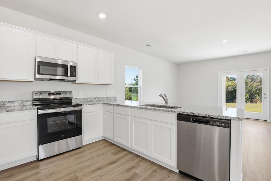 Furnished interior view inside a new home in Central Creek, Goose Creek (Image 10).