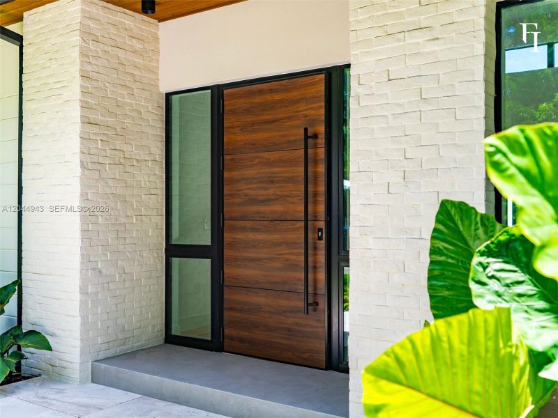 Exterior details and patio area of a home in , Coral Gables (Image 2). Exterior details and patio area of a home in , Coral Gables (Image 2).