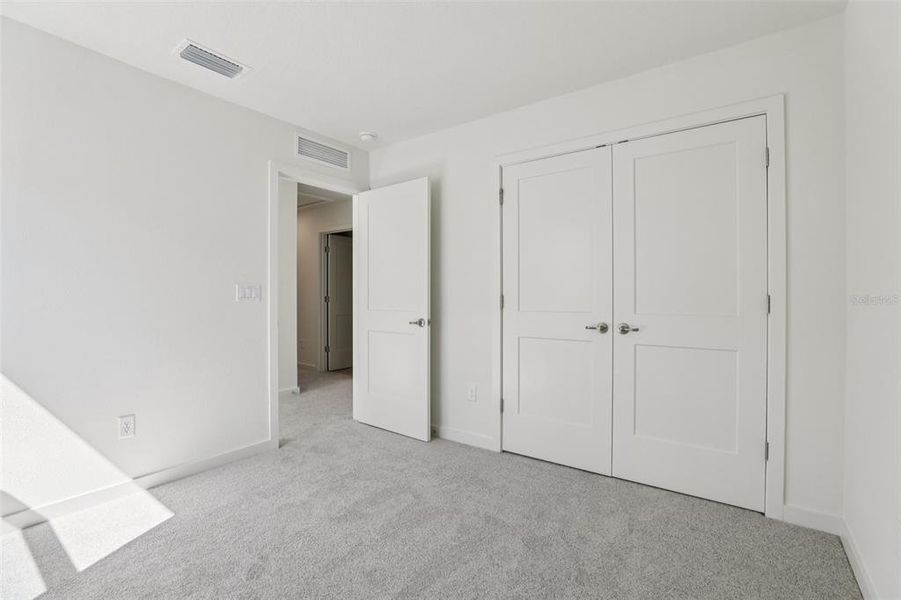 Spacious, unfurnished interior of a new home in Trinity Place, St. Cloud (Image 34).